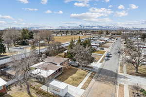 Birds eye view of property with a mountain view