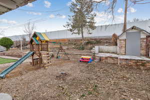 View of play area with a shed