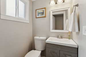 Bathroom with toilet and vanity