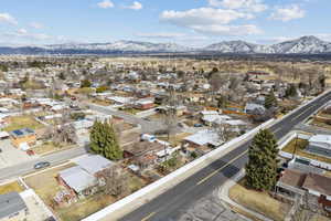 Birds eye view of property with a mountain view