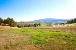 View of mountain feature with a rural view