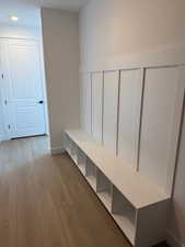 Mudroom with light wood finished floors