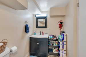 Bathroom featuring toilet and vanity