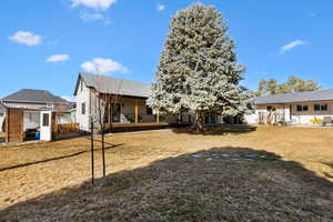 Back of house featuring ADU and Main house