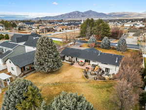 Birds eye view of property and ADU featuring a mountain view