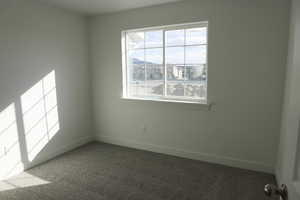 View of carpeted spare room