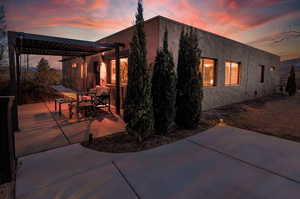 View of patio featuring a pergola