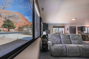 Living room featuring a mountain view and visible vents