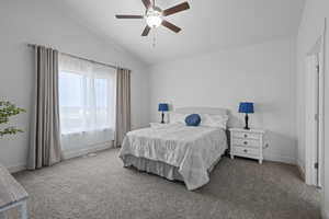 Master Bedroom featuring carpet, vaulted ceiling, and ceiling fan