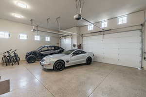 Garage featuring a garage door opener