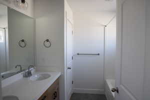 Bathroom with double vanity and a sink