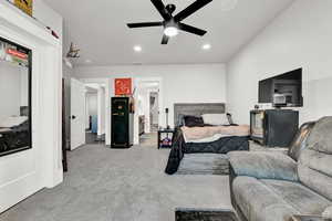 Bedroom featuring visible vents, recessed lighting, light carpet, and a ceiling fan