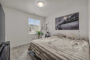 View of carpeted bedroom