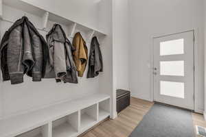 Mudroom featuring light hardwood / wood-style floors