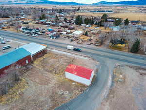 Birds eye view of property featuring a mountain view