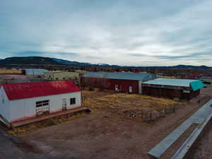 Drone / aerial view featuring a mountain view
