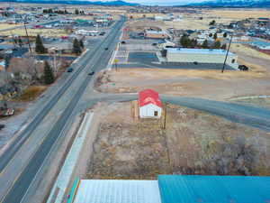 Birds eye view of property featuring a mountain view