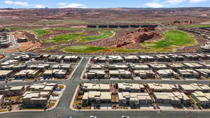 Aerial view featuring a residential view, golf course view, and a mountain view