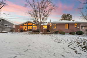 View of snow covered property