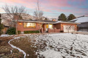 Ranch-style home featuring a garage