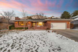 Ranch-style home with a garage