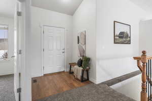 Entryway featuring wood-type flooring