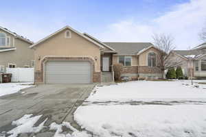 View of front of property with a garage