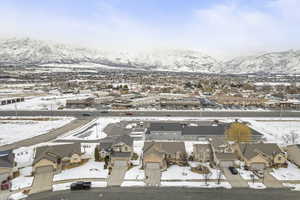 Snowy aerial view with a mountain view