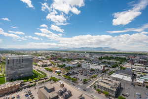 Birds eye view of property with a mountain view