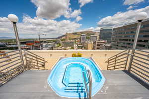 View of pool with a mountain view