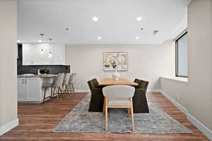 Dining space featuring dark hardwood / wood-style floors