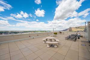 View of patio with a mountain view