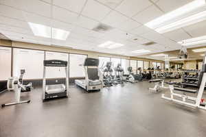 Exercise room with a paneled ceiling