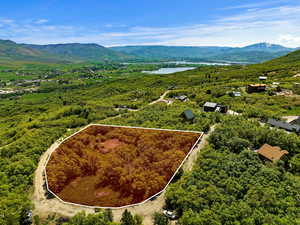 Aerial view with a water and mountain view