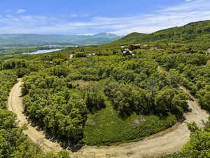 Bird's eye view with a water and mountain view