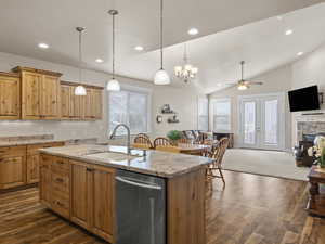 View from kitchen into dining area and family room.