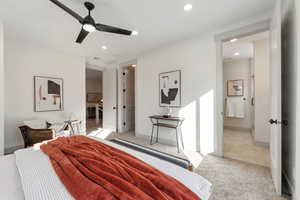 Bedroom featuring light carpet and ceiling fan