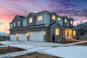 View of front of home featuring a garage