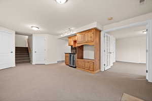 Unfurnished family room with wine cooler