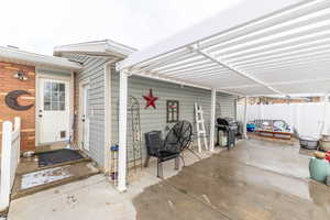 View of patio featuring a pergola