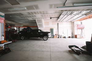 5 car garage that is large enough to fit an RV, and is wired for a mechanic lift.