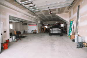 5 car garage that is large enough to fit an RV, and is wired for a mechanic lift.