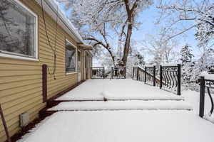 View of yard layered in snow