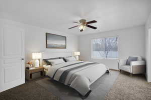 Bedroom featuring carpet and ceiling fan