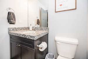 Bathroom with vanity and toilet