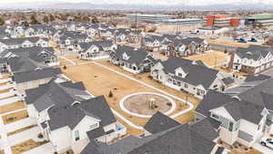 Birds eye view of property with a residential view