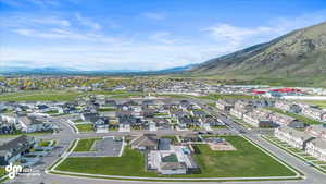 Drone / aerial view with a residential view and a mountain view