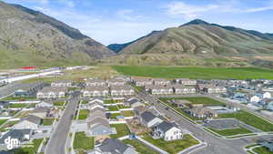 Drone / aerial view featuring a residential view and a mountain view