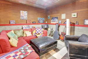 Living area with wood ceiling