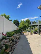 Exterior space featuring fence and a patio